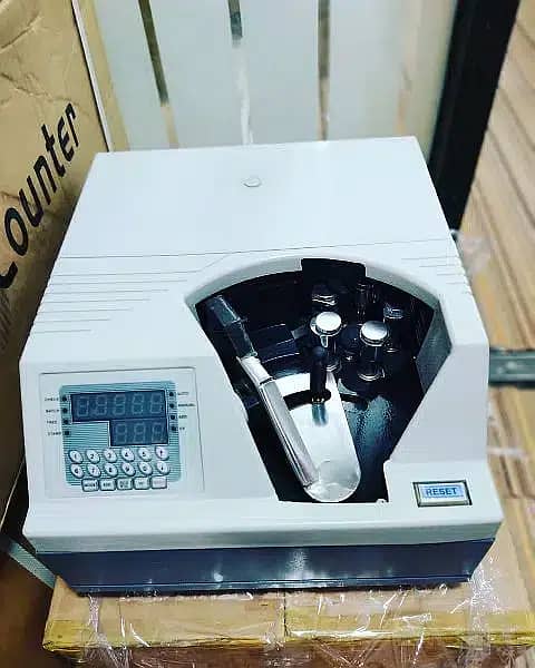 cash counting Machine, mix note counting with fake detection Pakistan 8