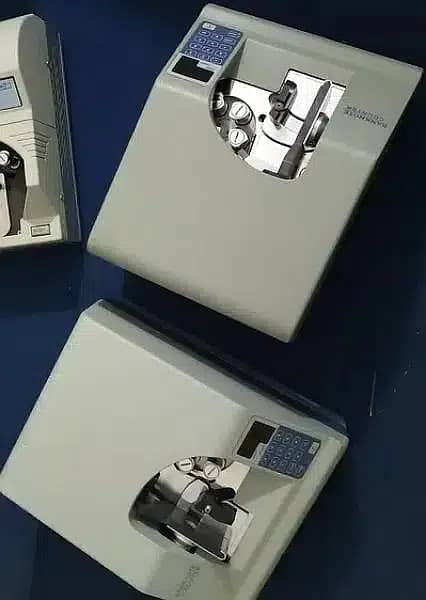 cash counting Machine, mix note counting with fake detection Pakistan 9