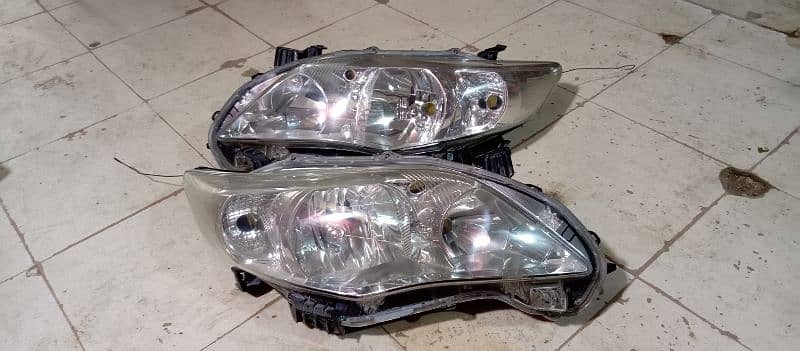 carolla 2012 head lights 03171132388 0