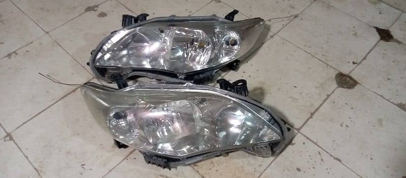 carolla 2012 head lights 03171132388 1