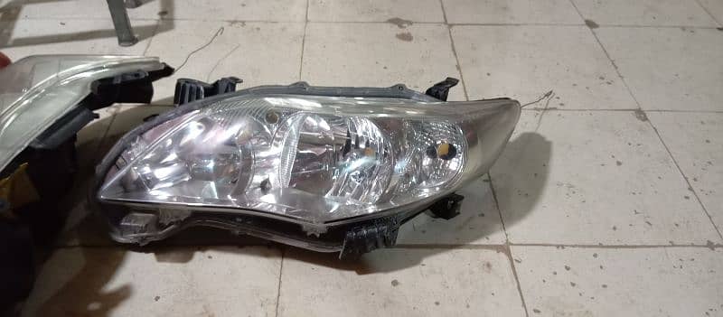 carolla 2012 head lights 03171132388 2