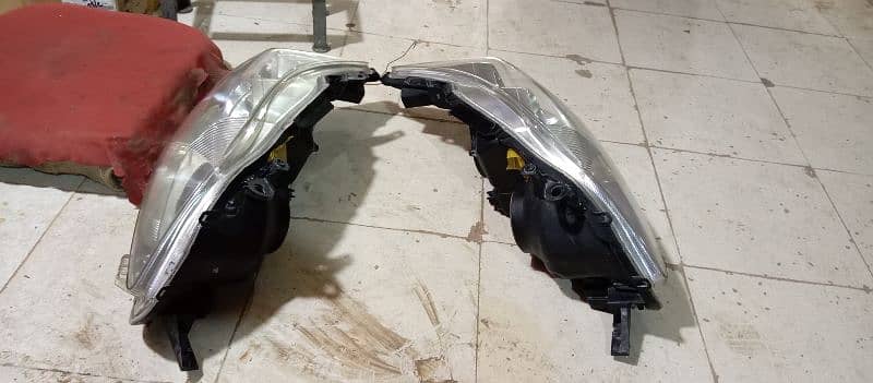 carolla 2012 head lights 03171132388 3