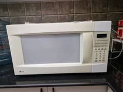 LG full size 60 litres microwave oven in mint condition .