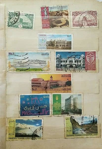 vintage post stamp collection book with various Pakistani stamps 8