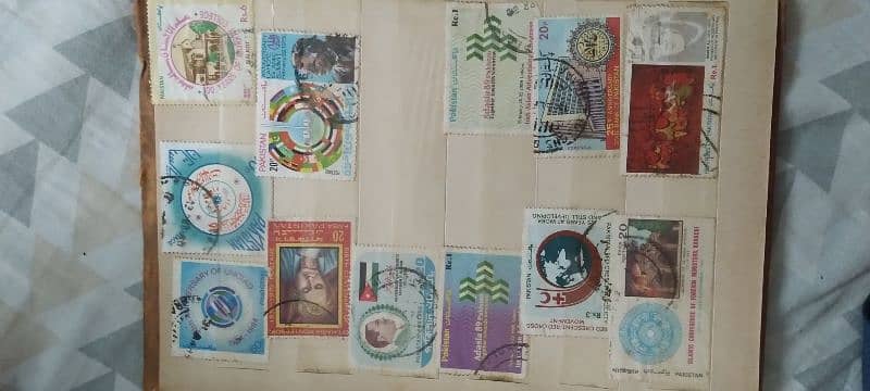 vintage post stamp collection book with various Pakistani stamps 11