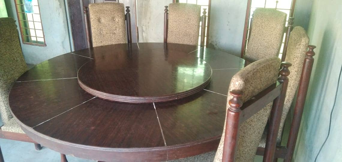 Revolving top round wooden dining table set with 6 chairs 3