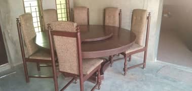 Revolving top round wooden dining table set with 6 chairs