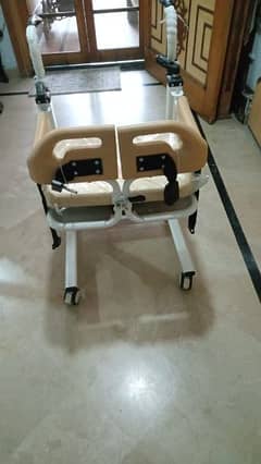 patient lift and transfer chair with commode.