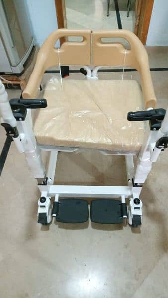 patient lift and transfer chair with commode. 1