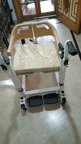 patient lift and transfer chair with commode. 2