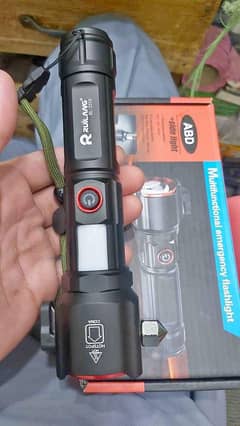 Powerful 2-in-1 Emergency Flashlight & Charging Bank with 1KM rang tor
