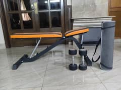 Orange Gym Bench with dumbells 0