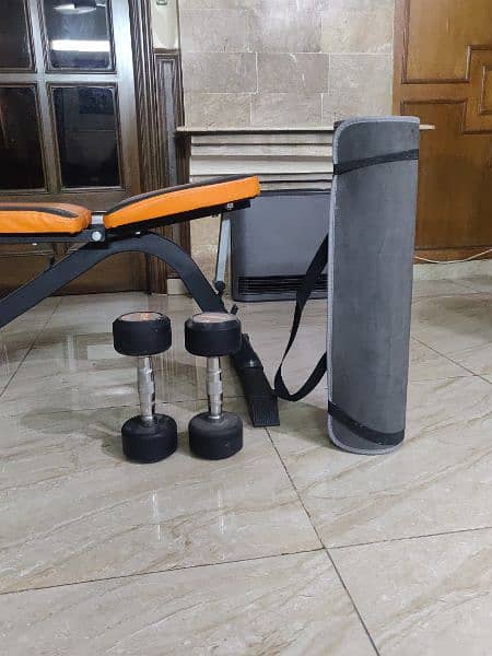 Orange Gym Bench with dumbells 1