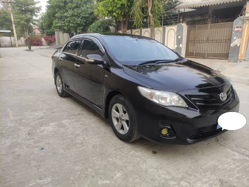 Toyota Corolla XLI 1.3 total genuine non accidnt 2009 model alloy rim 0