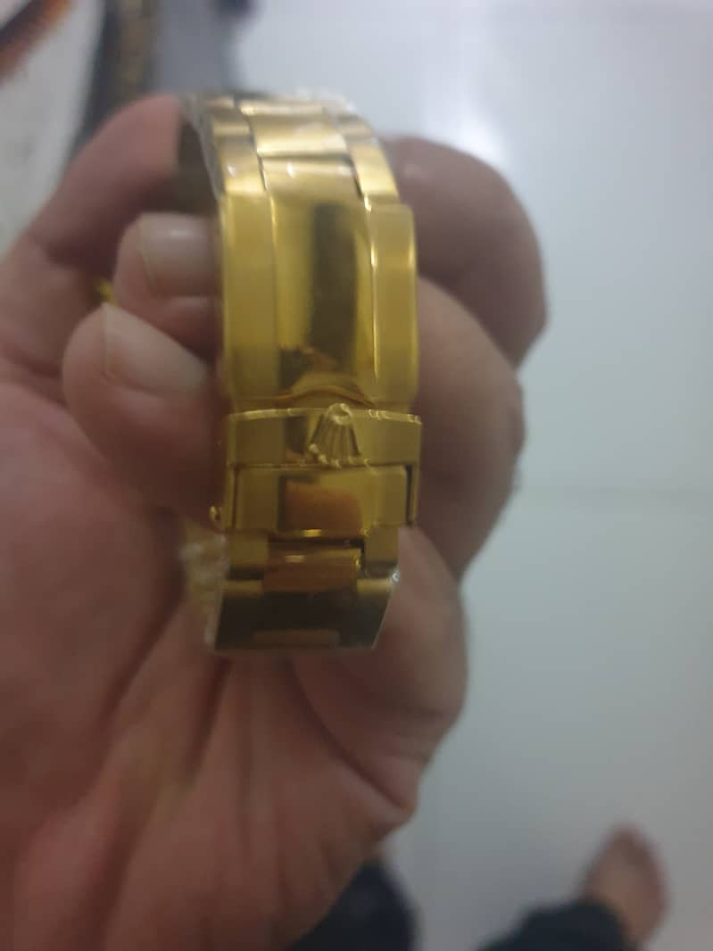 Gold watch 1