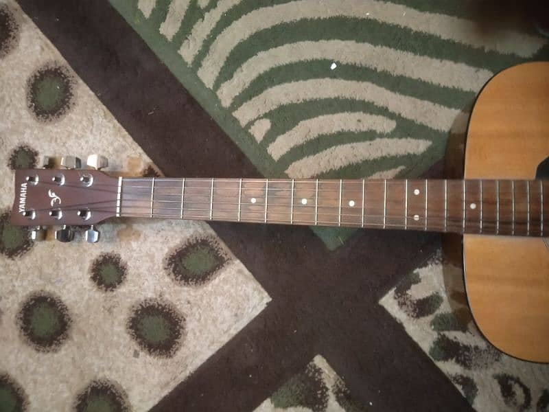 Yamaha Acoustic guitar with 9.5 out of 10 condition for sell 3