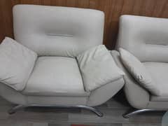 4 seater beautiful leather sofa with three glass tables