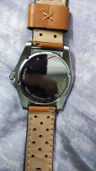 original Casio and Fossil watch 9