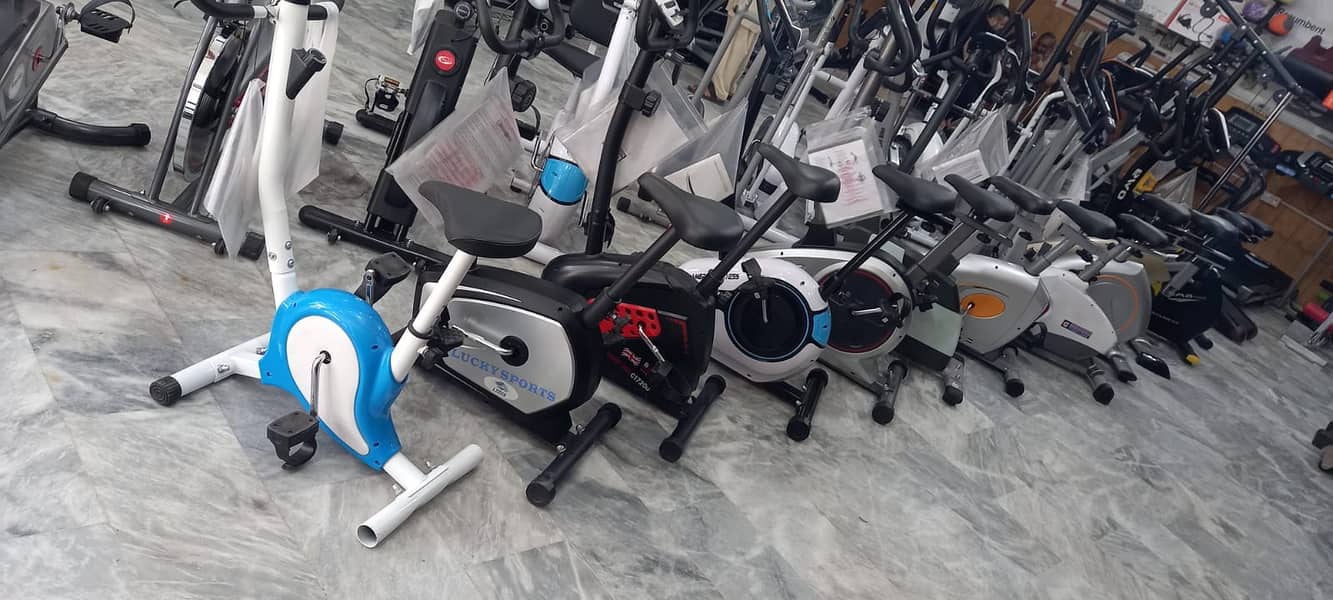elliptical Exercise treadmill recumbent upright bike spin bike DUMBBEL 1