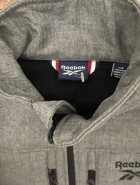 reebok brand new jacket (large size) original price 150$ 3