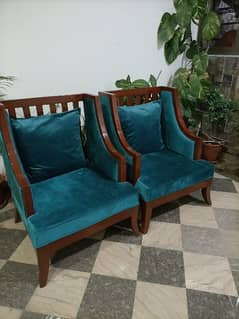 A pair of Shesham chairs.