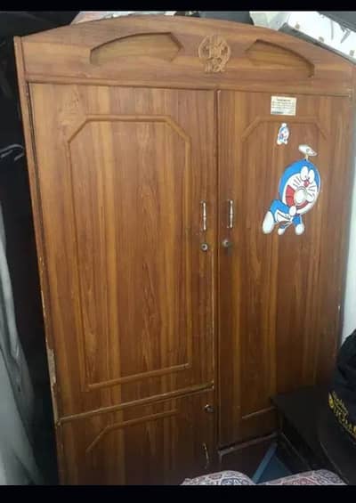 Two door cupboard with one cabinet and a drawer