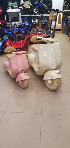 kids electric vaspa scooter bettery operated