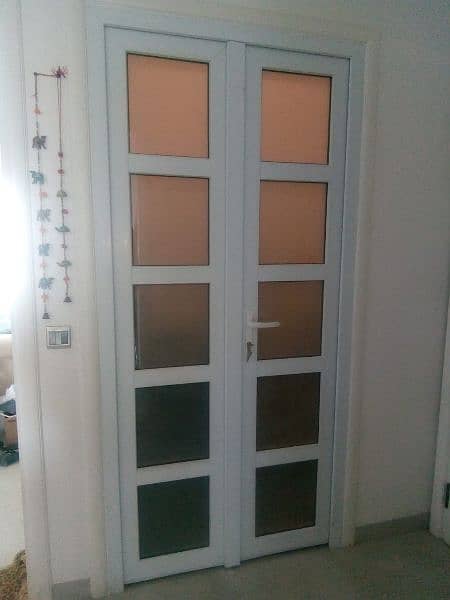 uPVC  bathroom door and siladng windows kichan ceabnit 11