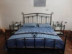 Road iron bed with 2 side tables or with led tolley or 2 chairs  table
