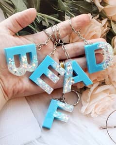 Resin keychains, Resin alphabet keychains, Customized resin keychains.