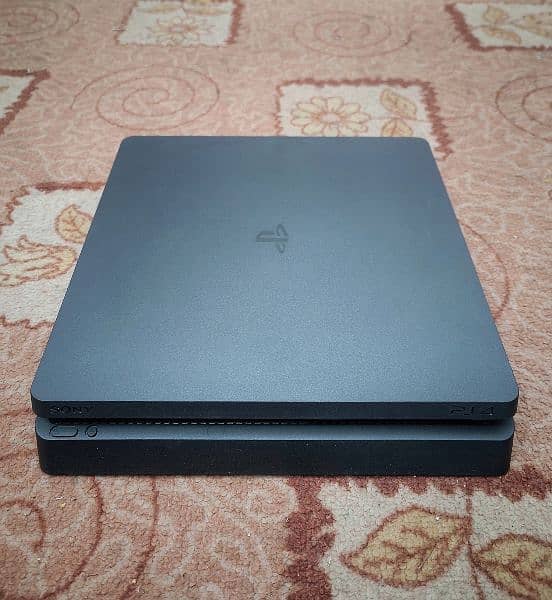 PS4 Slim 500 GB in Brand New Condition (Only 6 months used) 1