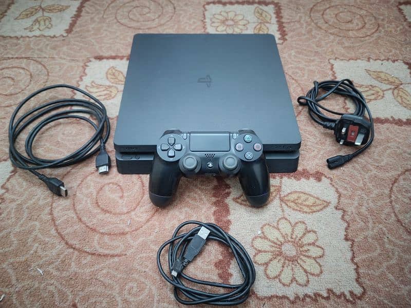 PS4 Slim 500 GB in Brand New Condition (Only 6 months used) 0