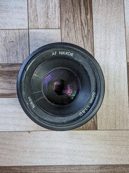 Nikon 50mm F-1.8D condition 10 by 9 1