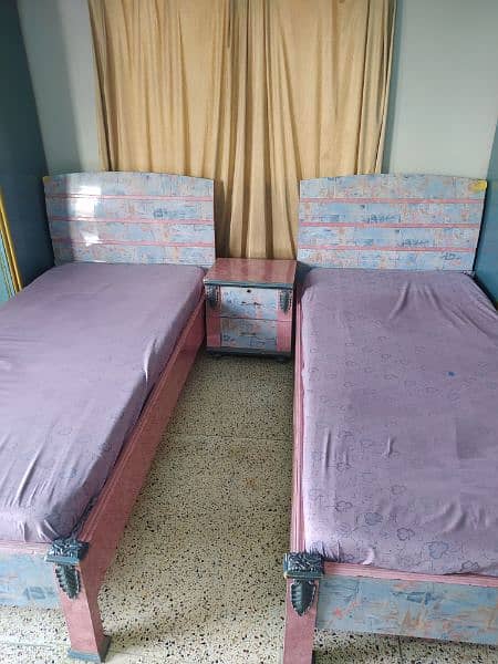 2 single bed with side table 1