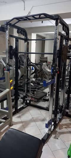 Power Rack Smith Trainer functional gym setup dumbbell treadmill plate