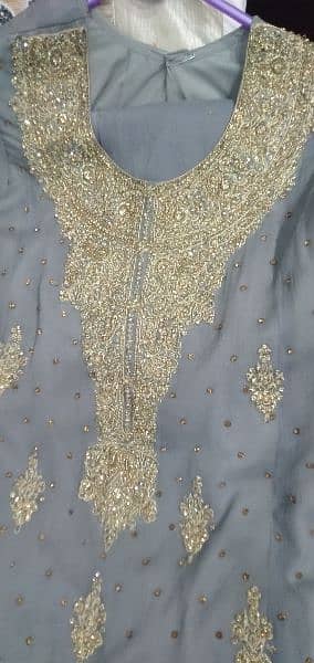 Grey colour maxi golden work with dupatta and trauser 1