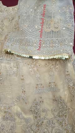 heavily embroided golden dress