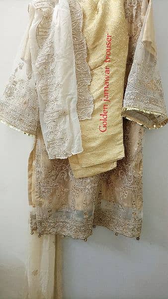 heavily embroided golden dress 1