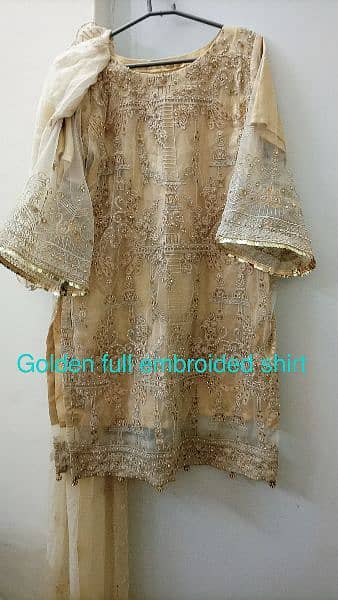 heavily embroided golden dress 2