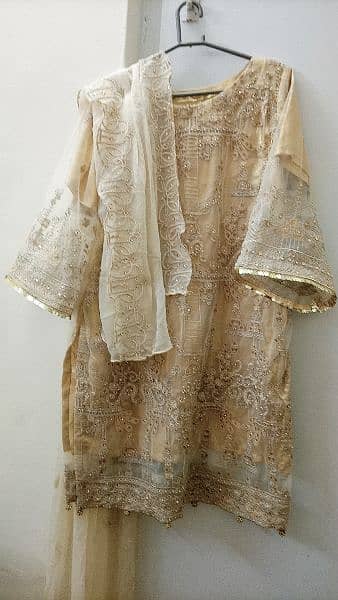 heavily embroided golden dress 7