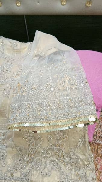 heavily embroided golden dress 15