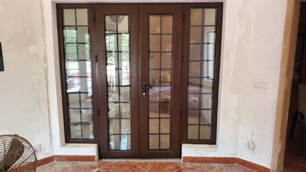 upvc window and door system and almunium and glass work 6