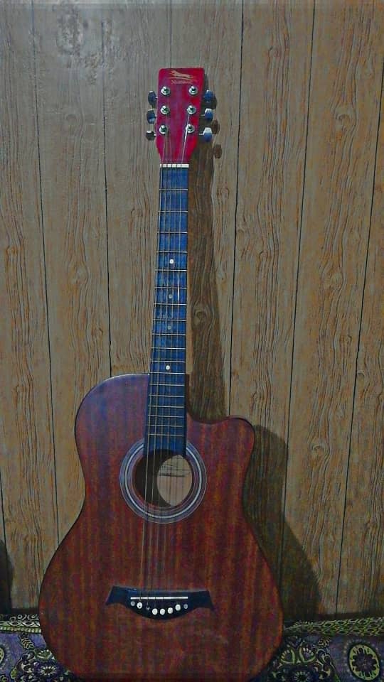 great guitar with wooden color and strong strings 0