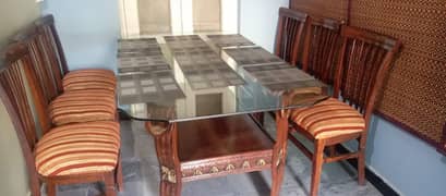 Dinning table (wooden). . .