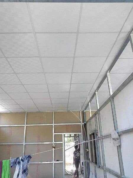 False Ceiling / Wall panels / Wood Flooring / Dampa Ceiling 9