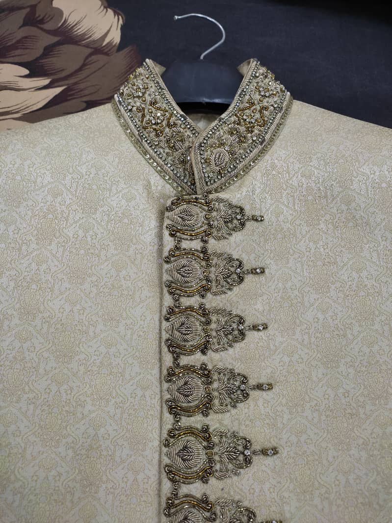 Groom sherwani fully hand work. 4