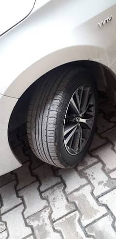original 16 inchs grande rim and tyre very less used like new no fault