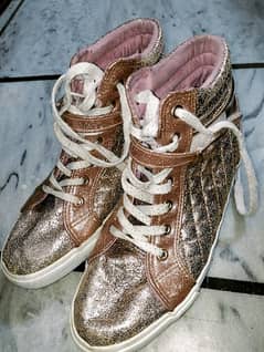 Golden sneakers available 0