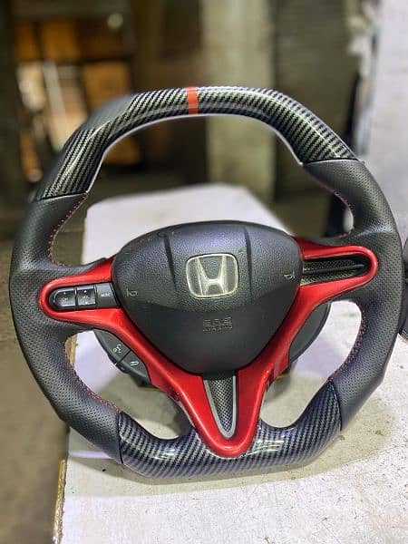Honda rebon+civic carbon fiber multimedia steering 1