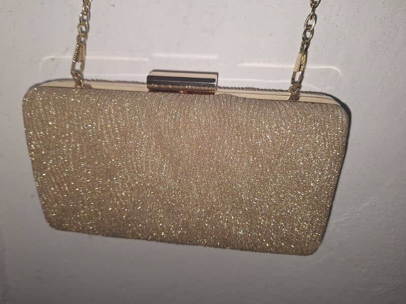 golden clutch with golden chain 0